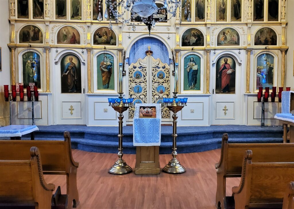 A beautiful image of our Church's Iconostas at St. Mary's Orthodox Church in Saint Clair, Pennsylvania. The photo also depicts new hardwood flooring and blue carpeting that was added during our recent renovations.