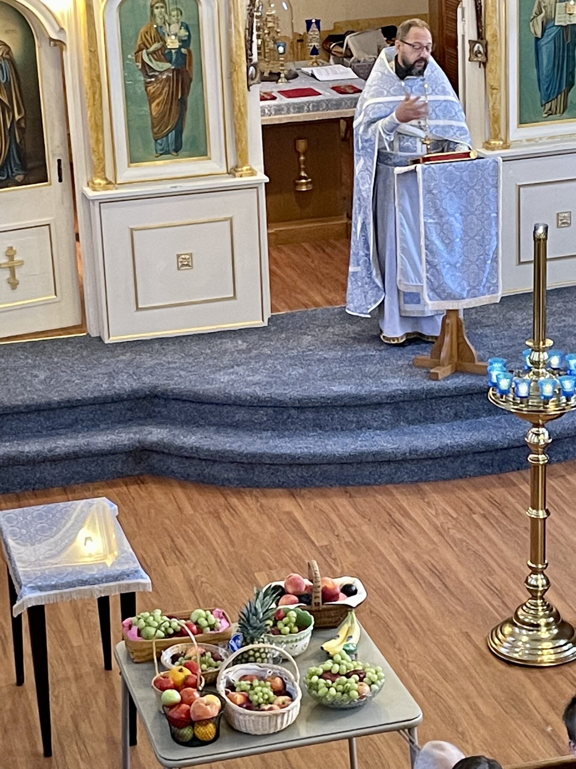Orthodox priest reads the gospel