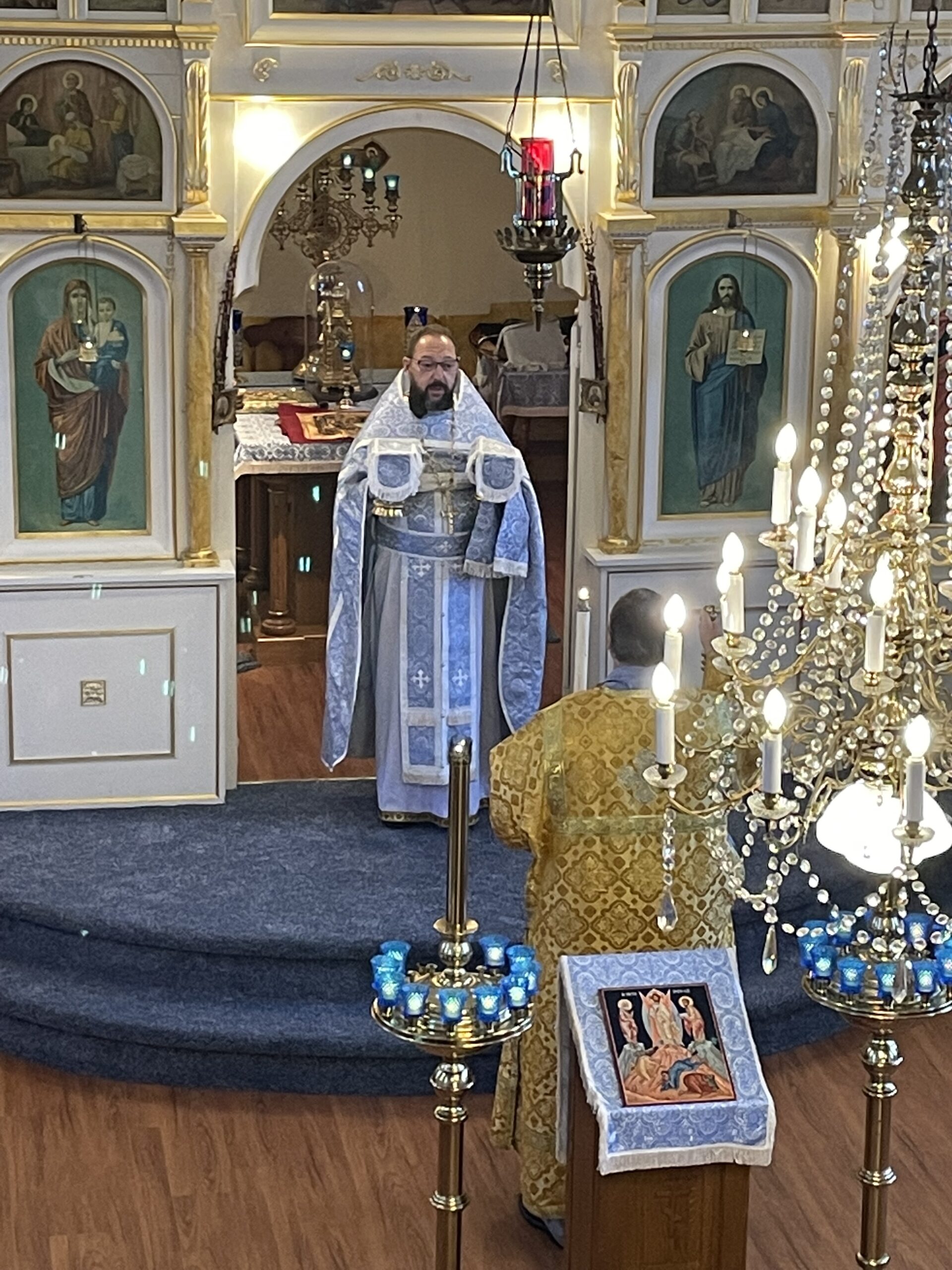 Orthodox priest presents the gifts