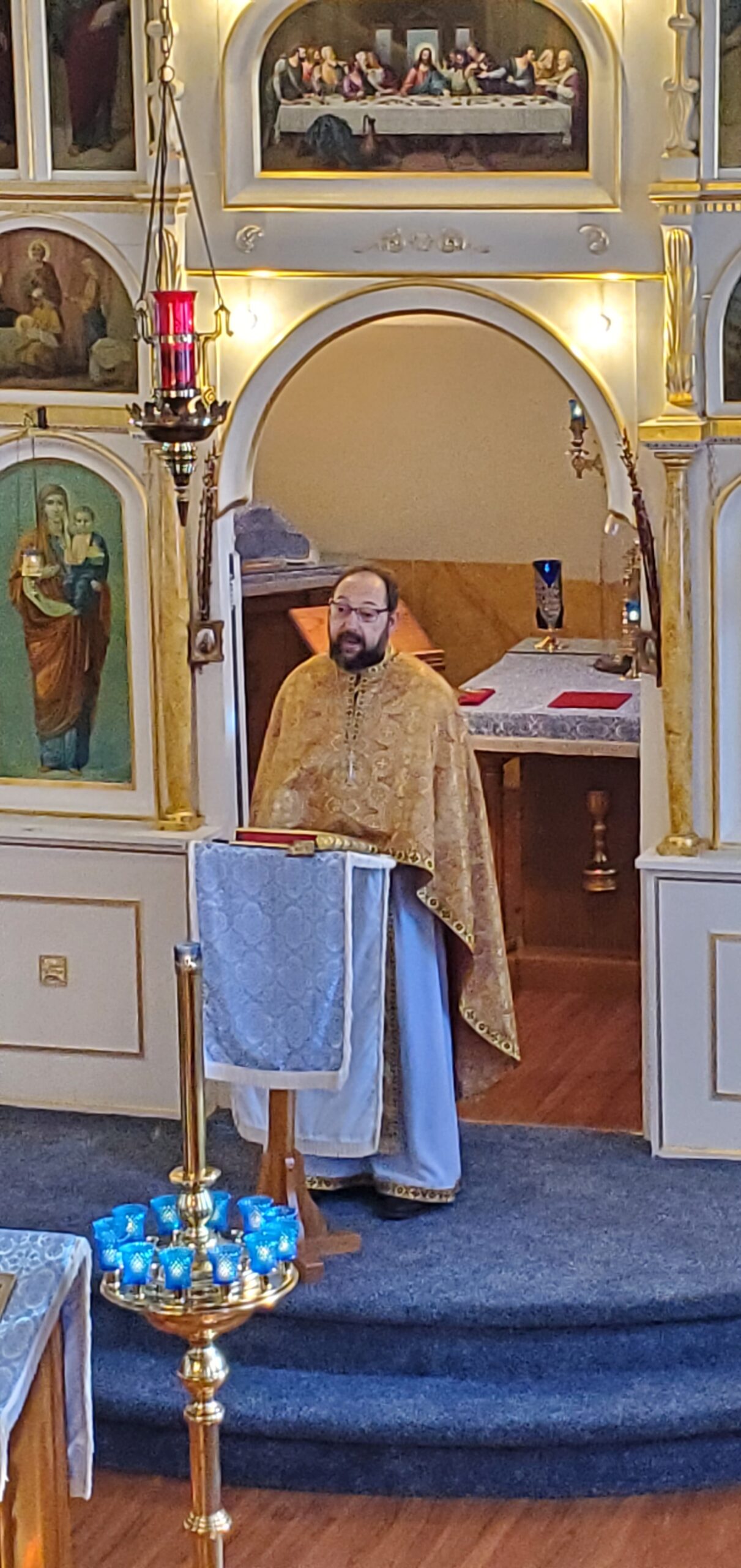 Orthodox priest delivers a sermon during Divine Liturgy